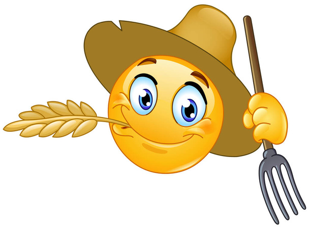 Happy farmer of rancher emoji emoticon chewing a barley straw and holding a pitchfork - Vector, afbeelding