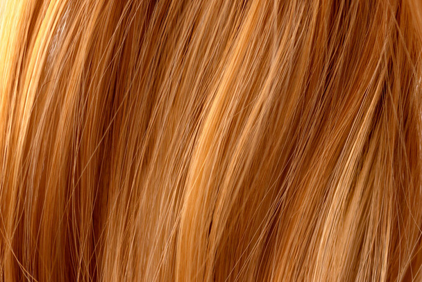 Red curly hair texture closeup. Red hair background. - Fotó, kép