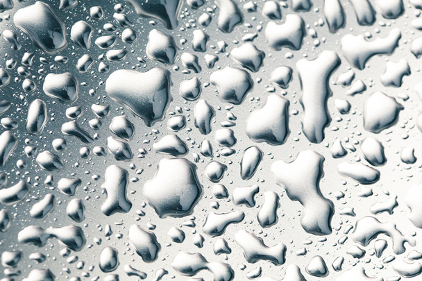 капли воды на фоне из нержавеющей стали
 - Фото, изображение