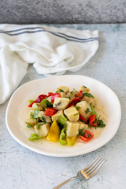 Artichoke Salad. Artichoke salad with olive oil on a stone background. Healthy meals. close up - Fotografie, Obrázek