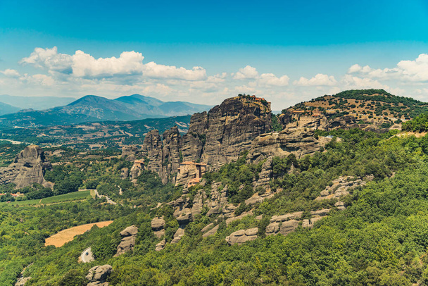 The famous Orthodox monastery on the top of Meteora rock formation in Greece. Summer travel visit. Education and knowledge about the world. High quality photo - 写真・画像