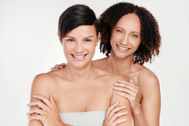 Beauty isnt reserved for just one person. Cropped portrait of two beautiful mature women posing against a grey background in studio - Foto, imagen