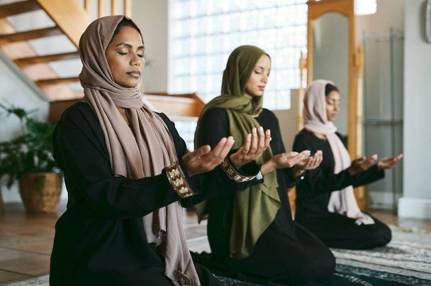This has been a time of prosperity. a group of muslim women praying together - Valokuva, kuva