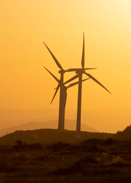 wind generators in the mountains of the Basque Country at sunset. High quality photo - Photo, Image