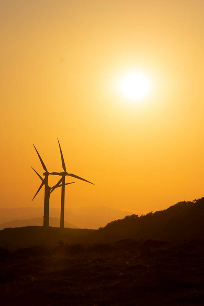 wind generators in the mountains of the Basque Country at sunset. High quality photo - Photo, Image