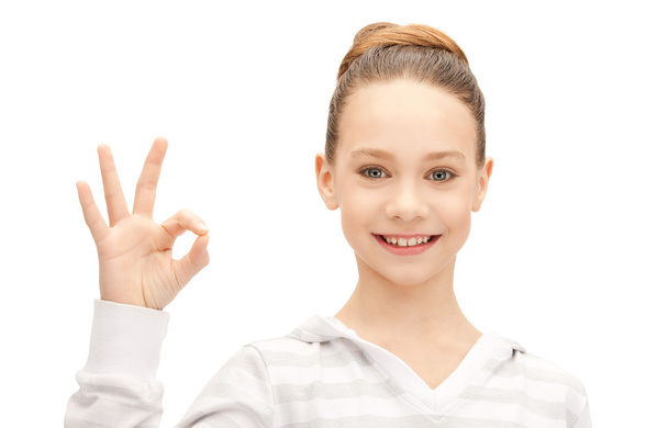 Lovely teenage girl showing ok sign - Фото, зображення