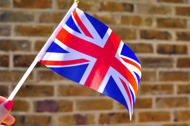 κλείσιμο της εθνικής σημαίας της Μεγάλης Βρετανίας αντίγραφο χώρου. - Φωτογραφία, εικόνα