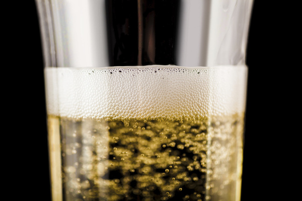 Champagne in glass closeup - Fotó, kép