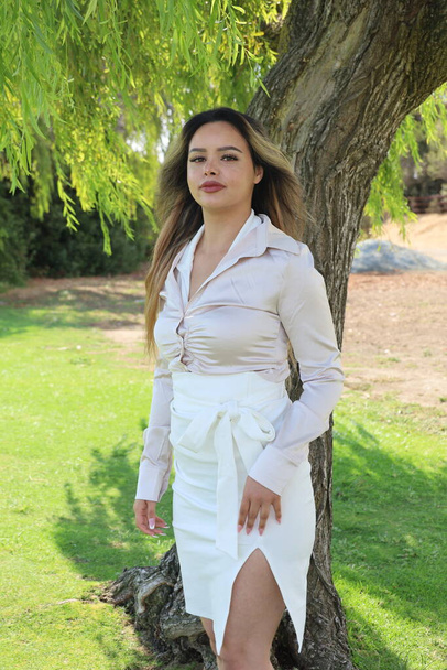 Photo of beautiful lady in a park on a summer day - Foto, imagen