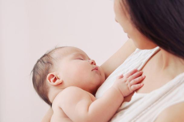 soft image of newborn baby with mother - Foto, Imagem