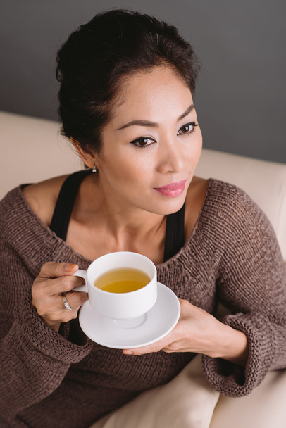 Drinking green tea - Zdjęcie, obraz