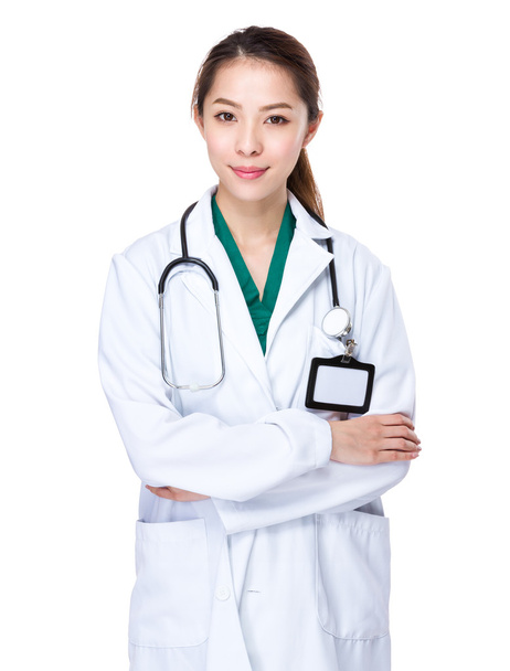 Female doctor with arms crossed - 写真・画像