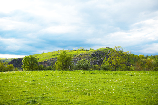 Hill on a background of green field - Fotografie, Obrázek