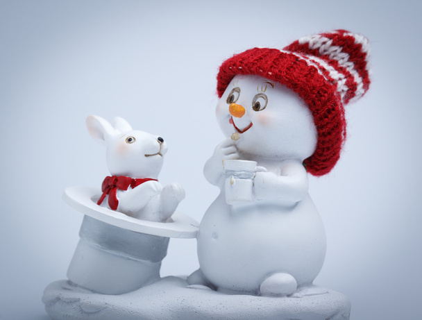 Cheerful snowman shows tricks - Photo, Image