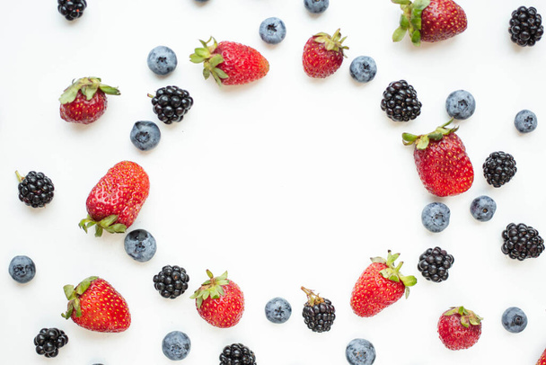 berries frame with blueberry, blackberry and strawberry - Fotoğraf, Görsel