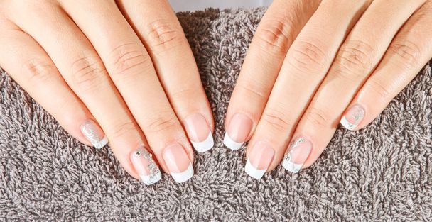 Female soft hands with beautiful french manicure - Photo, Image