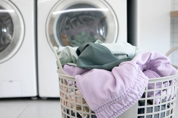 aesthetic laundry concept, Putting laundry into the washing machine - Fotoğraf, Görsel