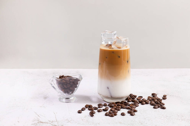 Summer drink background, iced latte coffee with espresso and milk - Foto, imagen