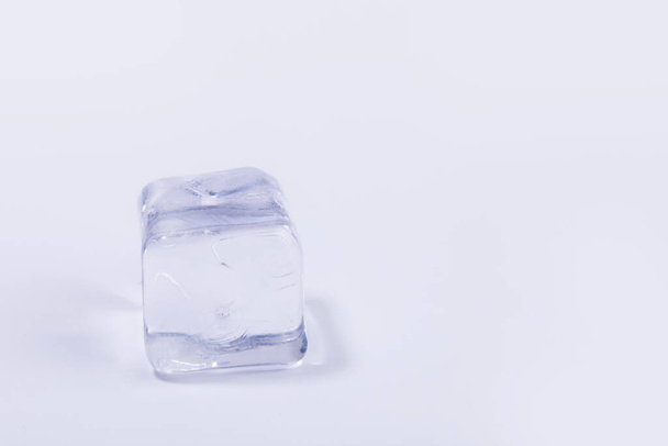 creative summer photo of ice, white background - Foto, afbeelding