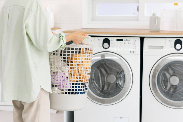 aesthetic laundry concept, Putting laundry into the washing machine - Fotografie, Obrázek