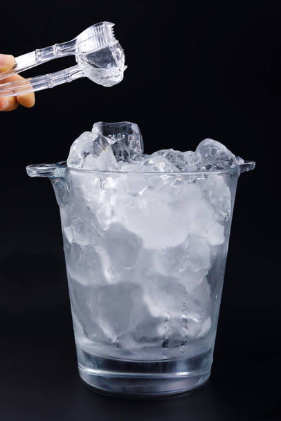 creative summer photo of ice, black background - Zdjęcie, obraz