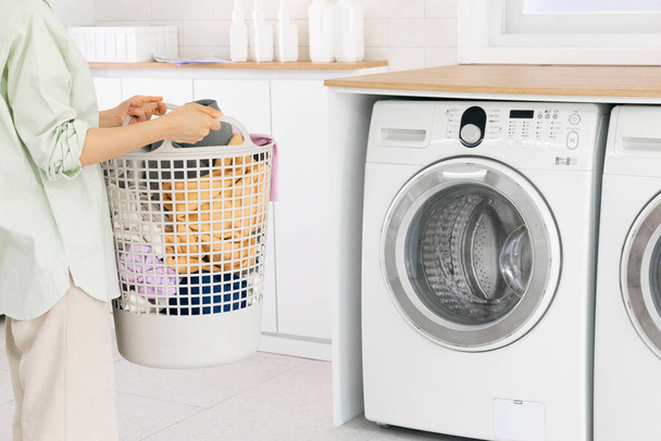 aesthetic laundry concept, Putting laundry into the washing machine - Foto, Imagem