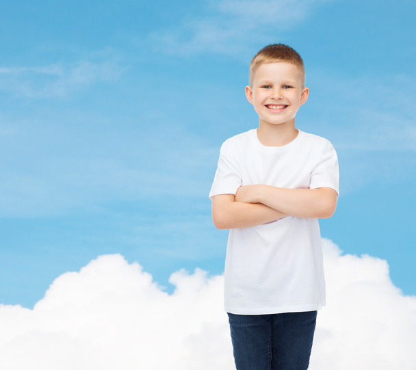 smiling little boy in white blank t-shirt - Фото, изображение