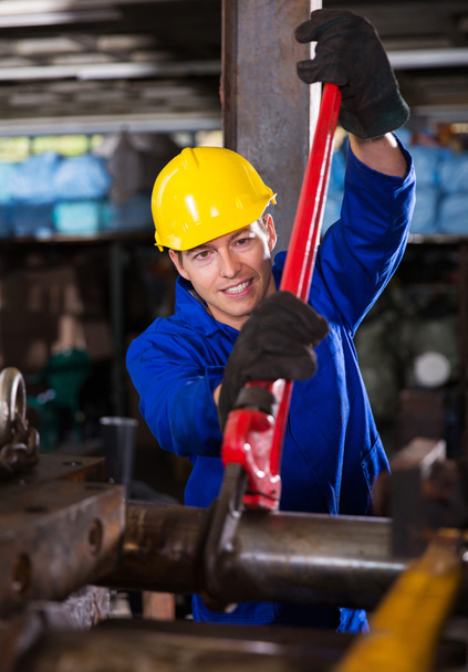 Manual worker using wrench - Foto, Bild
