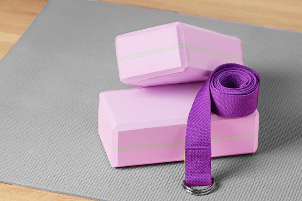 Yoga blocks, exercise mat and yoga belt for training. Yoga equipment. - Φωτογραφία, εικόνα