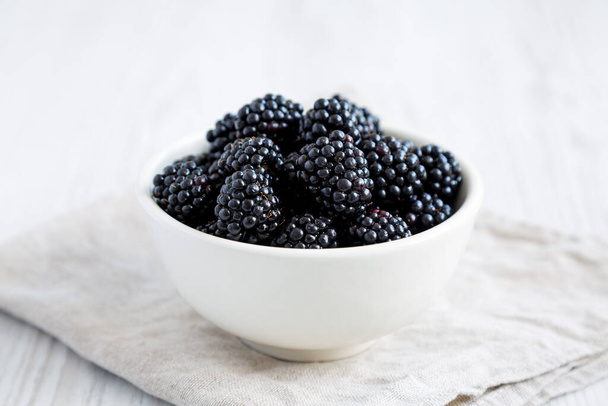 Raw Blackberries in a Bowl, side view.  - Fotoğraf, Görsel