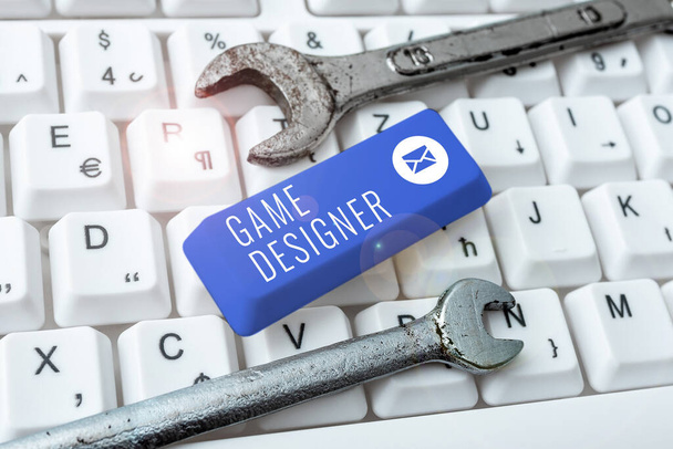 Hand writing sign Game Designer, Business concept Campaigner Pixel Scripting Programmers Consoles 3D Graphics -48977 - Foto, afbeelding