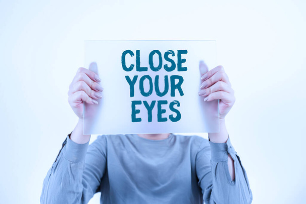 Conceptual display Close Your Eyes, Business overview Cover your sight we have a surprise for you do not peek Woman Holding Banner And Promoting The Company Brand To Achieve Goals. - Φωτογραφία, εικόνα