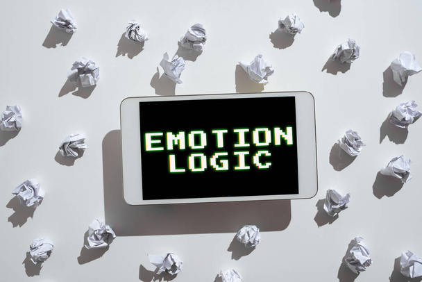 Text caption presenting Emotion Logic, Business overview Heart or Brain Soul or Intelligence Confusion Equal Balance Paper Wraps Placed Around Tablet With Important Informations. - Photo, Image