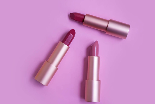 Lipstick on a colored background - Photo, Image