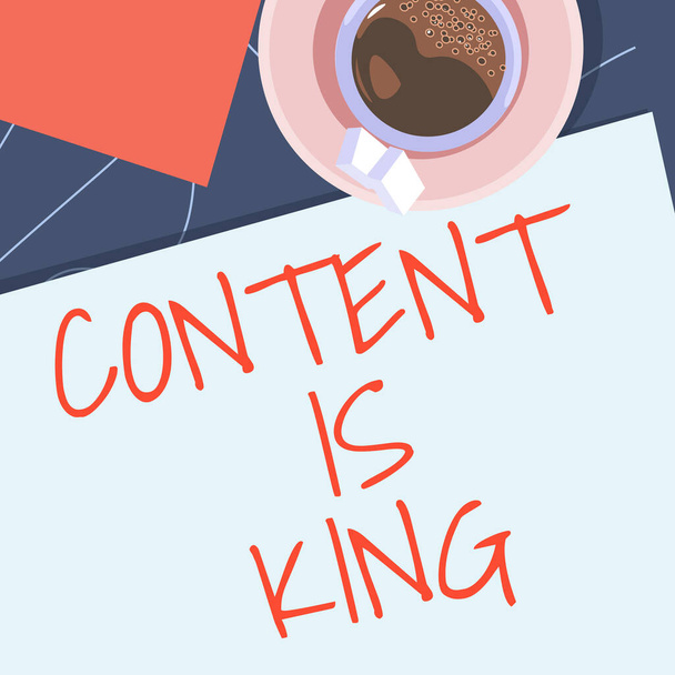 Text showing inspiration Content Is King, Word Written on Content is the heart of todays marketing strategies offee cup sitting on desk with notebook representing relaxed working space. - Фото, изображение