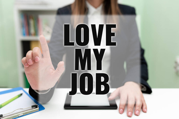 Text caption presenting Love My Job, Business concept To be pleased with the work that one does being comfortable Businesswoman Having Tablet On Desk And Pointing New Ideas With One Finger. - Photo, image