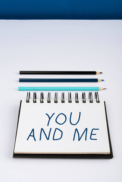Text caption presenting You And Me, Word Written on Couple Relationship compromise Expressing romantic feelings Important Informations Written On Notebook Next To Pencils. - Foto, imagen