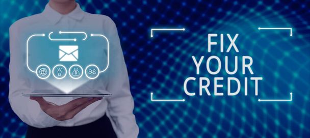 Conceptual display Fix Your Credit, Business concept Keep balances low on credit cards and other credit Woman Holding Tablet With Futuristic Frame And Presenting Crutial Messages. - Φωτογραφία, εικόνα