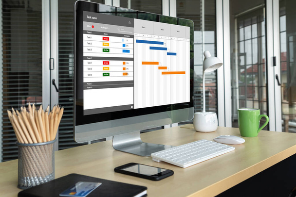 Projectplanningssoftware voor modish business projectmanagement op het computerscherm met tijdlijnkaart van het teamproject - Foto, afbeelding