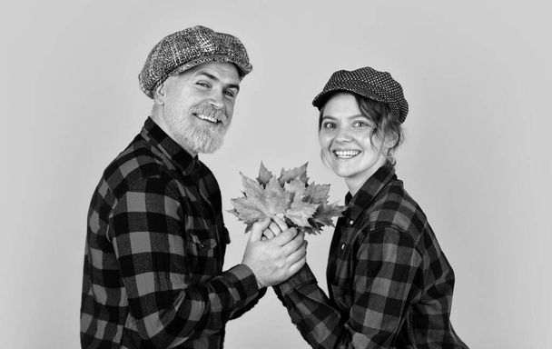 Romantic feelings. Fall in love. Happy relations. Vintage style. Cheerful couple dating in september. Autumn mood. Couple in love stylish outfit. Family time. Couple wear checkered hats and shirts. - Foto, imagen