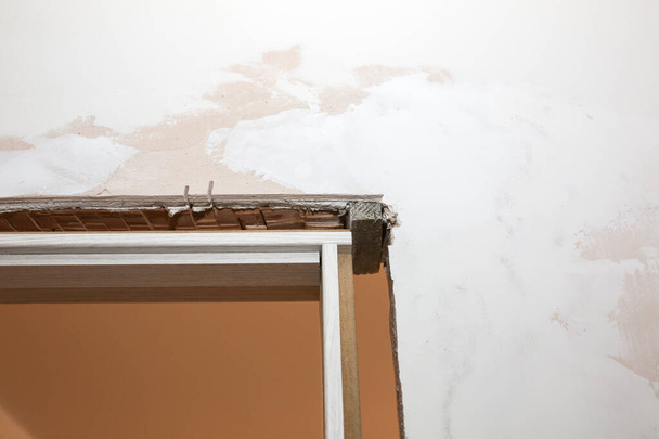 Installing the doors. Holes in the wall. Repair works. Maintenance in the apartment. - Fotó, kép