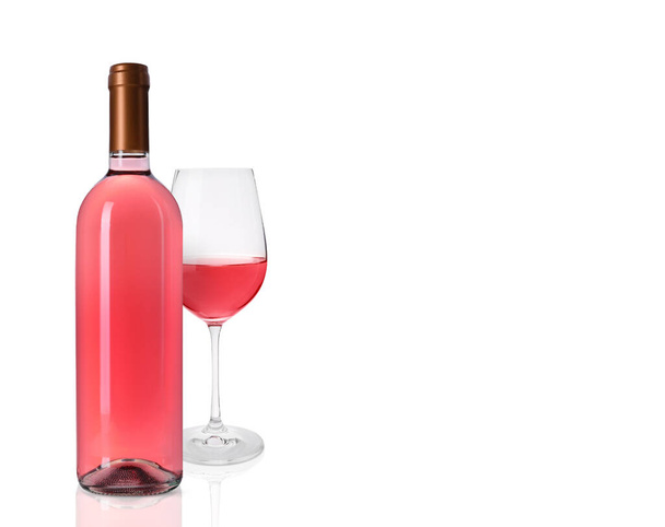 Bottle and glass of delicious rose wine on white background - Zdjęcie, obraz