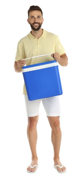Happy man with cool box on white background - Photo, image