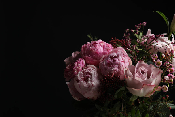 Beautiful bouquet with fresh flowers on dark background, space for text - Zdjęcie, obraz
