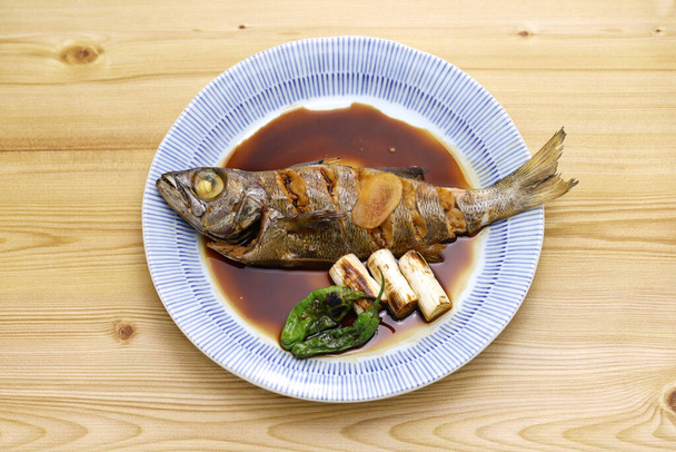 Kuromutsu no Nitsuke ( simmered Japanese bluefish ), Japanese cuisine - Фото, изображение