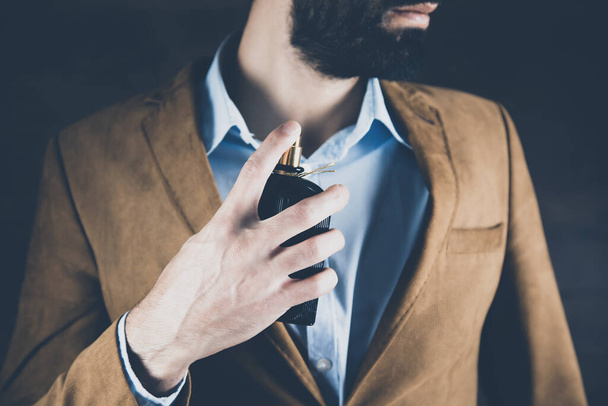 young business man hand perfume - 写真・画像