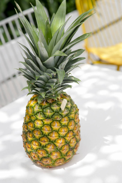Pina Colada cocktail made from fresh pineapple served on the beach bar table - 写真・画像