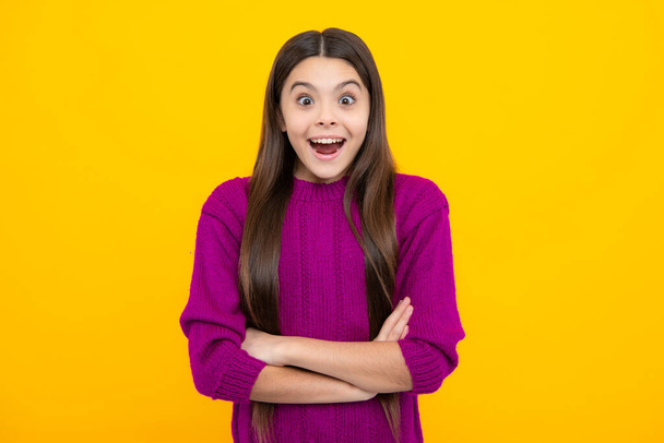 Shocked teenager child with amazed look on yellow background, amazement. Excited kids face. Amazed expression, cheerful and glad - Foto, imagen