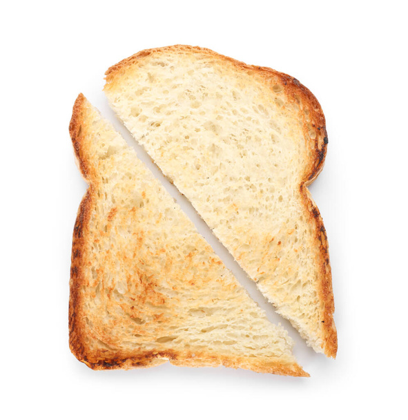 Cut slice of toasted bread on white background - Valokuva, kuva