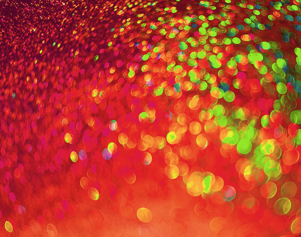 abstract glitter lights on red background with bokeh effect - Foto, immagini
